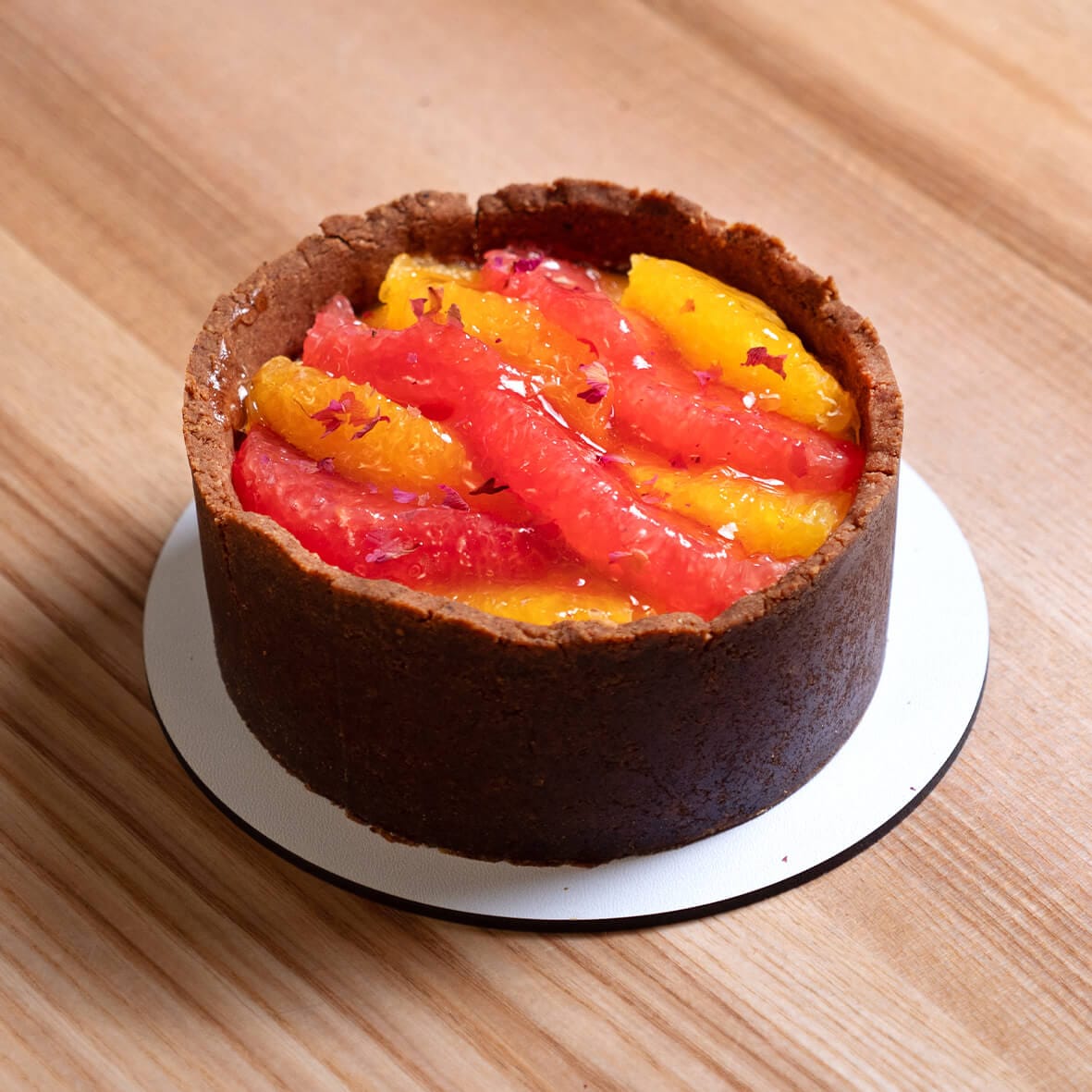 Бенто чизкейк VITAMIN C з філе апельсину і грейпфруту зверху від Cheesecake Family