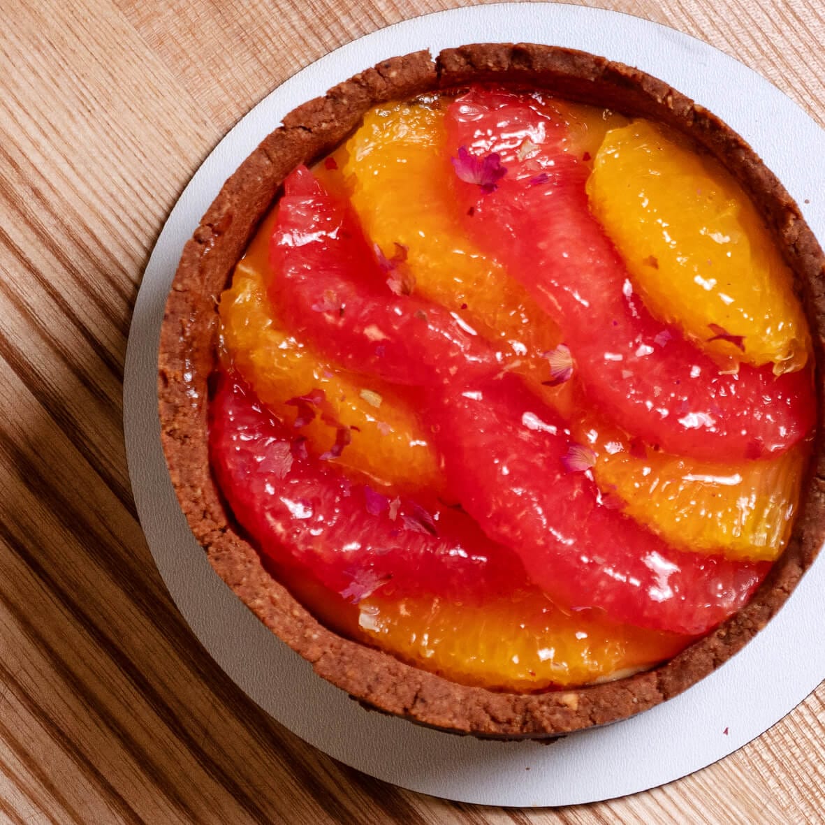 Бенто чизкейк VITAMIN C з апельсином і грейпфрутом текстура, вид зверху від Cheesecake Family